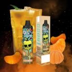 Vape and orange soda with citrus fruit slices.